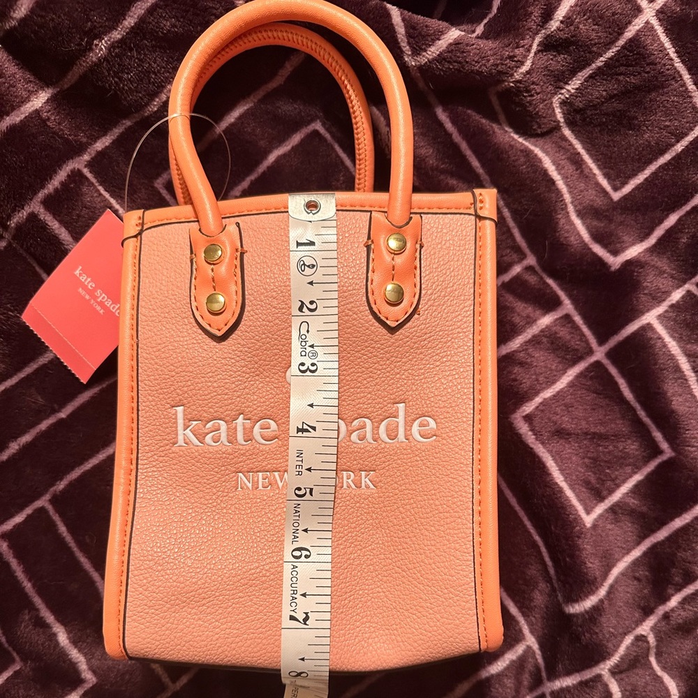 Authentic Kate Spade all leather crossbody. Never used adorable and very soft.